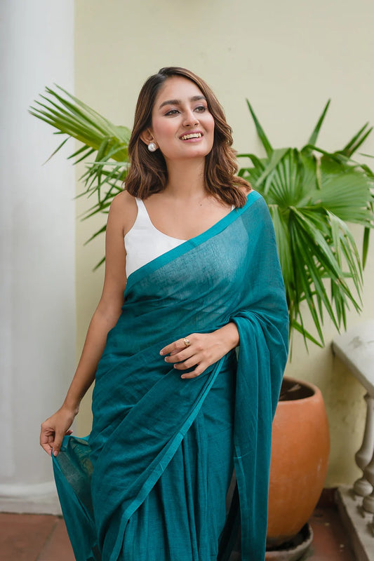 Teal Blue Plain Khadi Cotton Saree With Fancy Tassel Work