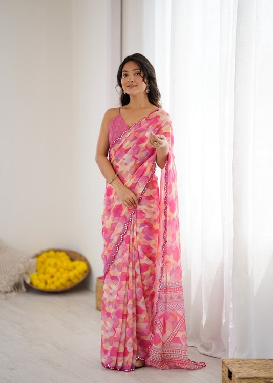 Pink Georgette Saree With Printed And Mirror Work With Arco Border