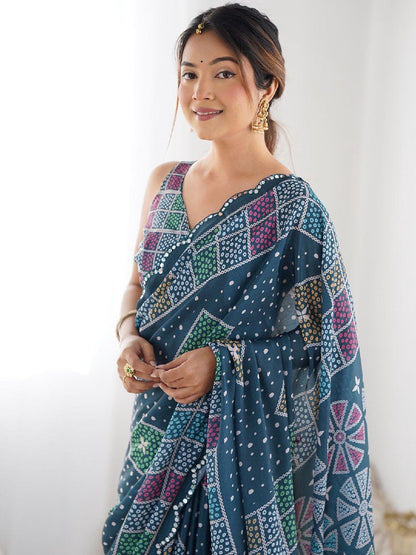 Blue Georgette Saree With Printed And Mirror Work With Arco Border