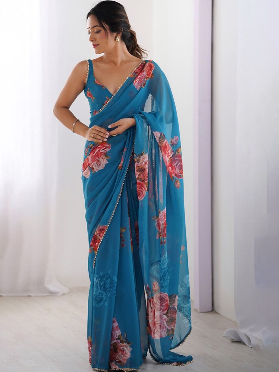 Blue Georgette Saree With Printed Work And Moti Border