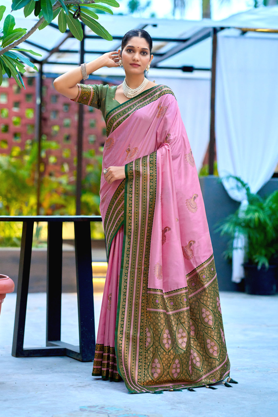 Full length view of baby pink Banarasi silk saree with zari weaving work