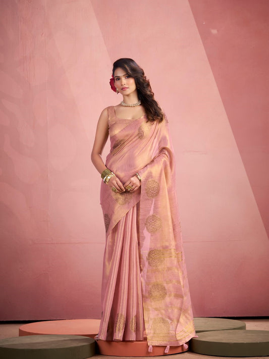 Woman wearing baby pink tissue silk saree with fancy zari weaving butta full front view