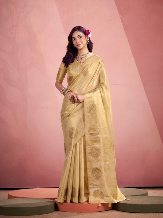 Woman wearing beige tissue silk saree with fancy zari weaving butta full front view