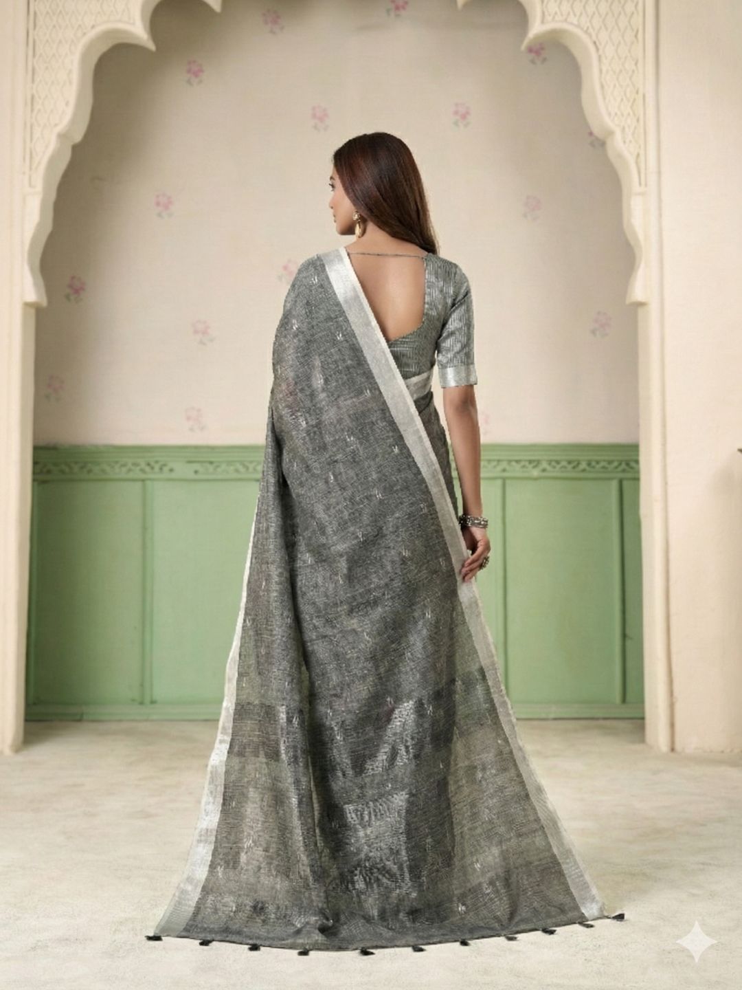 Full length view of gray linen silk saree with thread woven butti design showcasing graceful drape