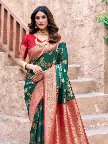 Side view of green Banarasi silk saree with flowing pallu showcasing zari border and Warli design