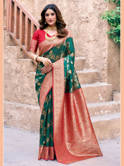 Woman wearing green Banarasi silk saree with Warli weaving work and zhallar border full front view