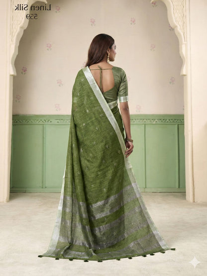 Back view of green linen silk saree with thread woven butti design highlighting graceful drape