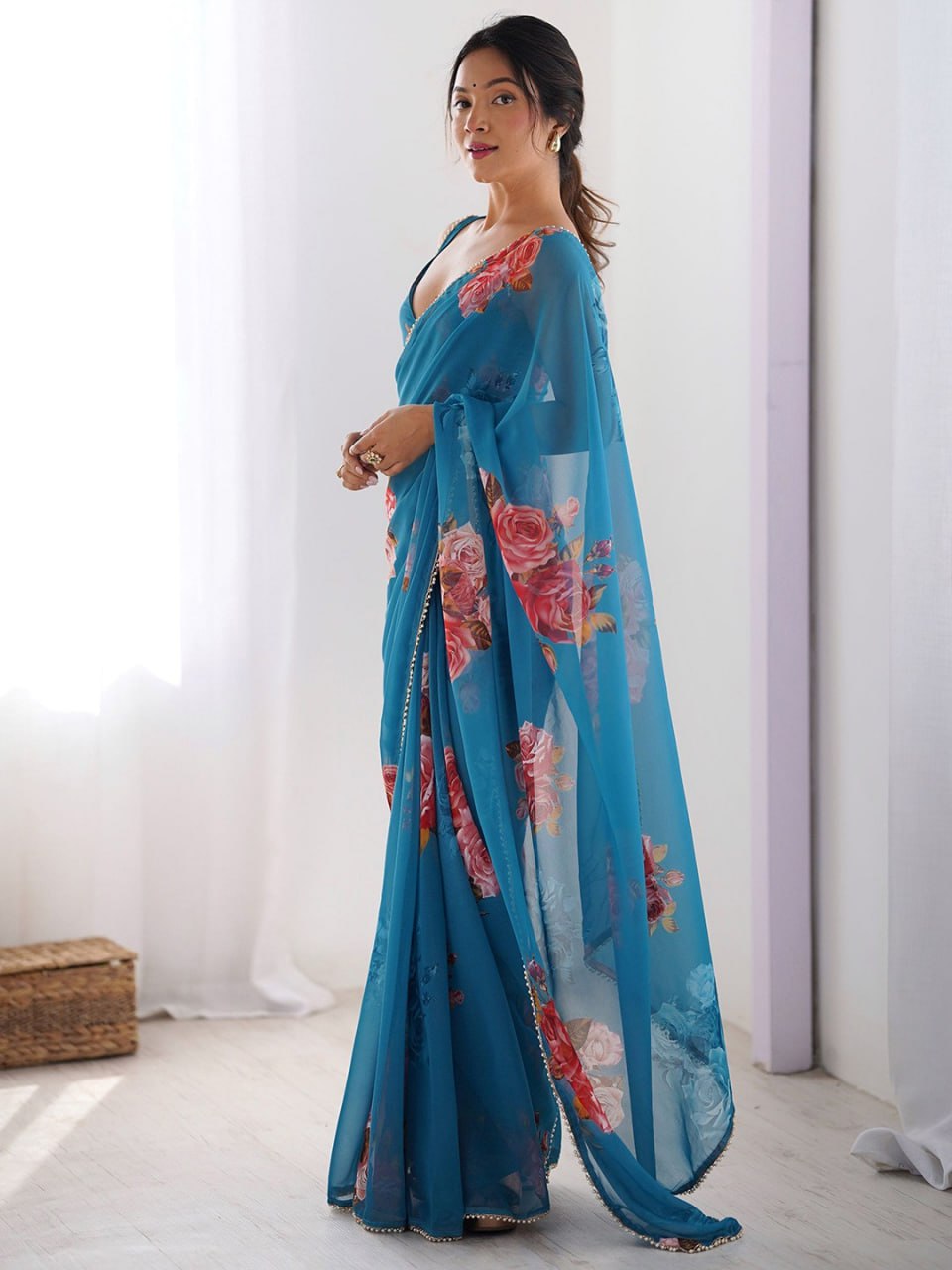 Blue Georgette Saree With Printed Work And Moti Border