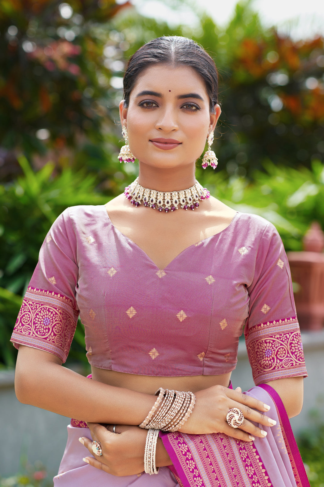 Closeup look of lavender Banarasi silk saree with zari weaving and designer border