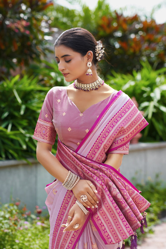 Model wearing lavender Banarasi silk saree with zari weaving and contrast border