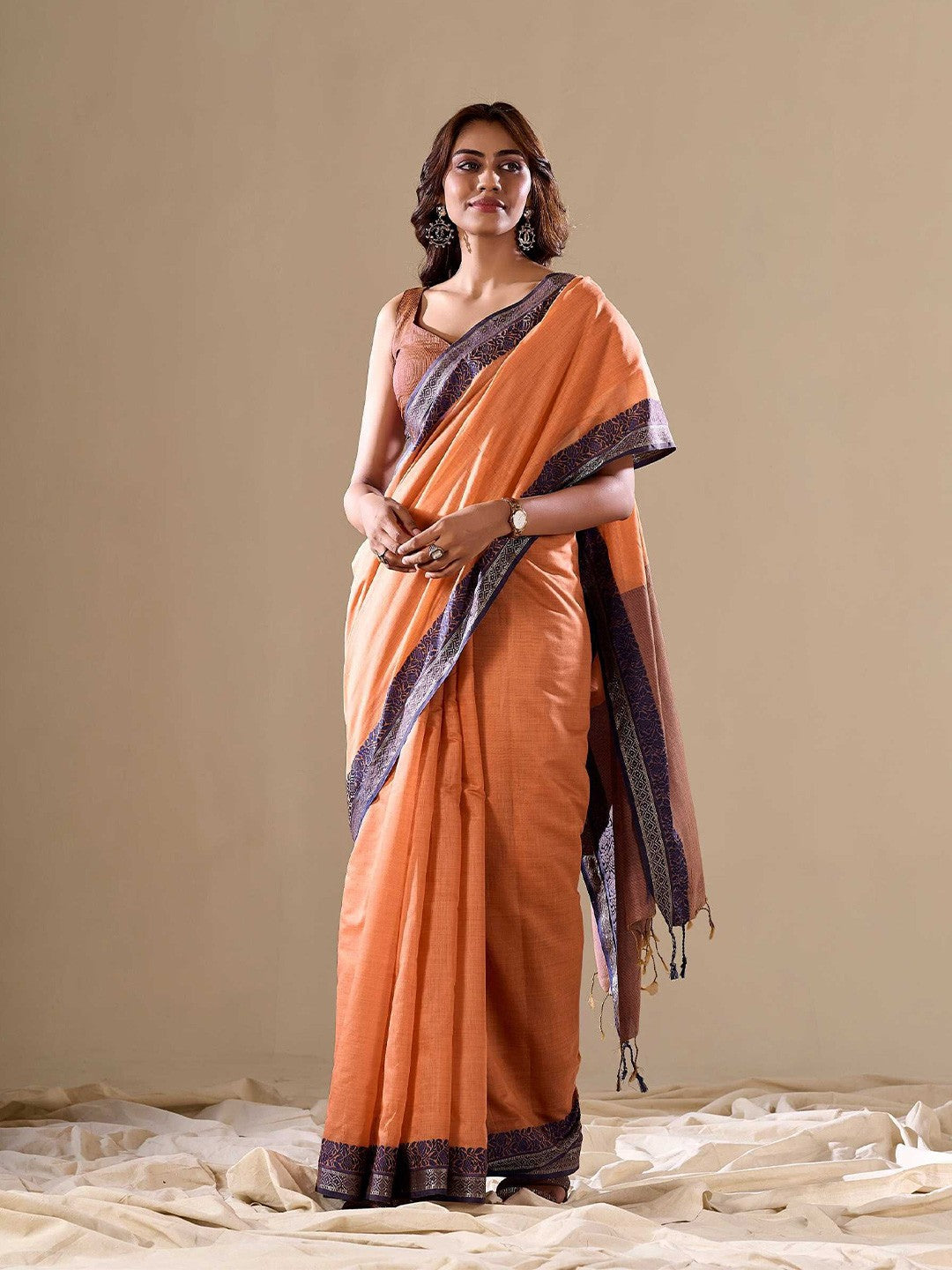 Orange linen cotton saree with weaving work