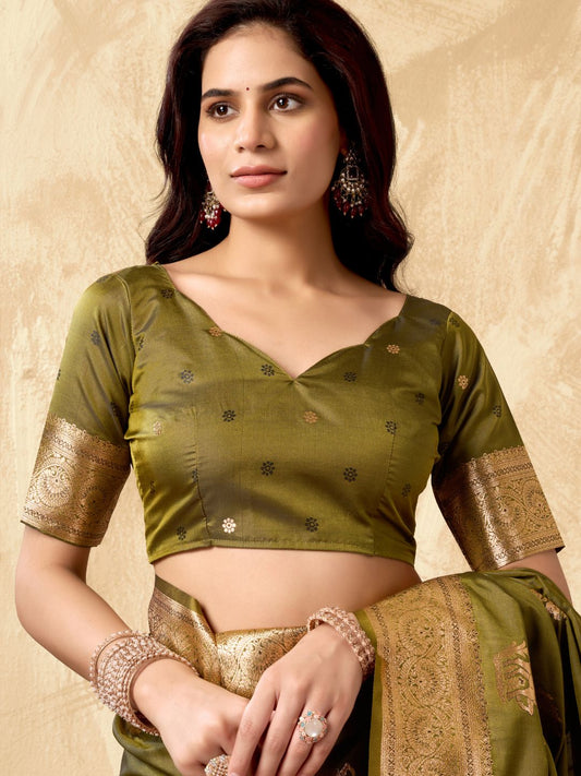 Close upper view of mehndi green Banarasi silk saree showcasing Warli weaving work and rich zari detailing