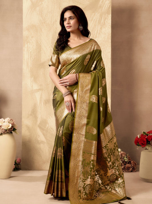 Woman wearing mehndi green Banarasi silk saree with Warli weaving work and zhallar border full front view