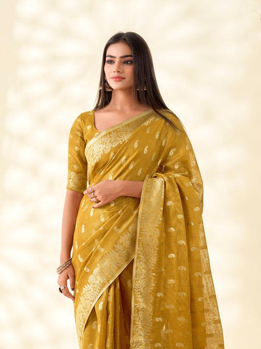 Close view of mustard yellow tissue linen silk saree showcasing zari weaving butti and elegant pallu detailing