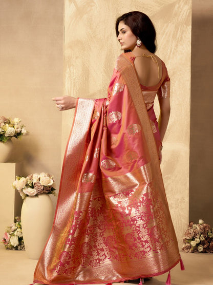 Side view of peach Banarasi silk saree with Warli weaving work showcasing graceful flow
