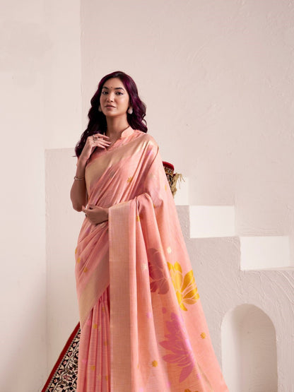 Side view of peach soft linen silk saree with floral pallu showcasing flowing drape