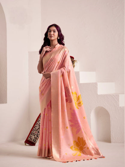 Woman wearing peach soft linen silk saree with floral pallu design full front view