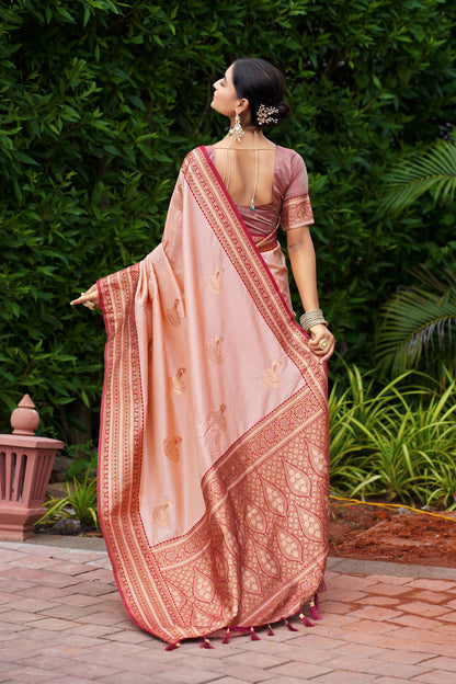 Contrast zari border work on peach Banarasi silk saree