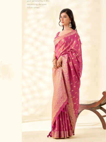 Model posing in pink tissue linen silk saree with zari weaving butti and pallu showing full length elegant styling