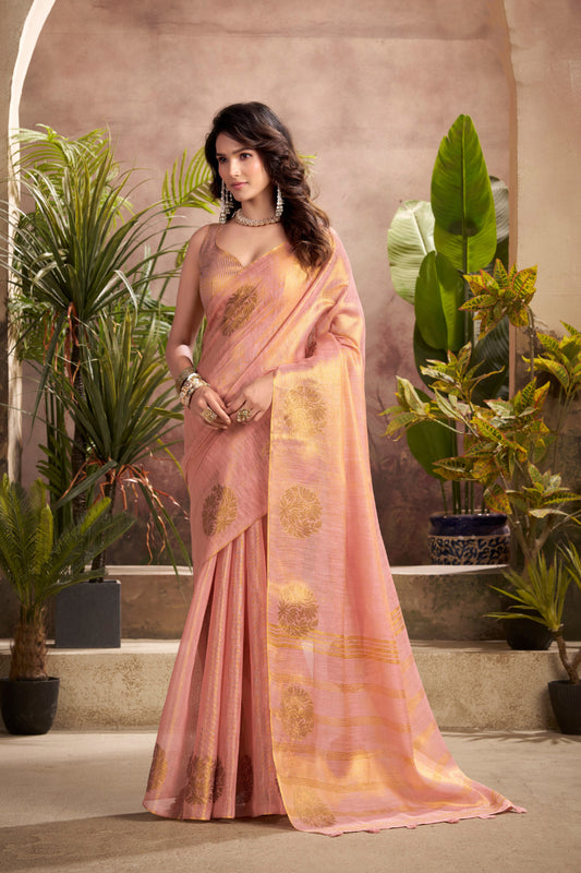Woman wearing pink tissue silk saree with zari weaving butta and zari border pallu full front view