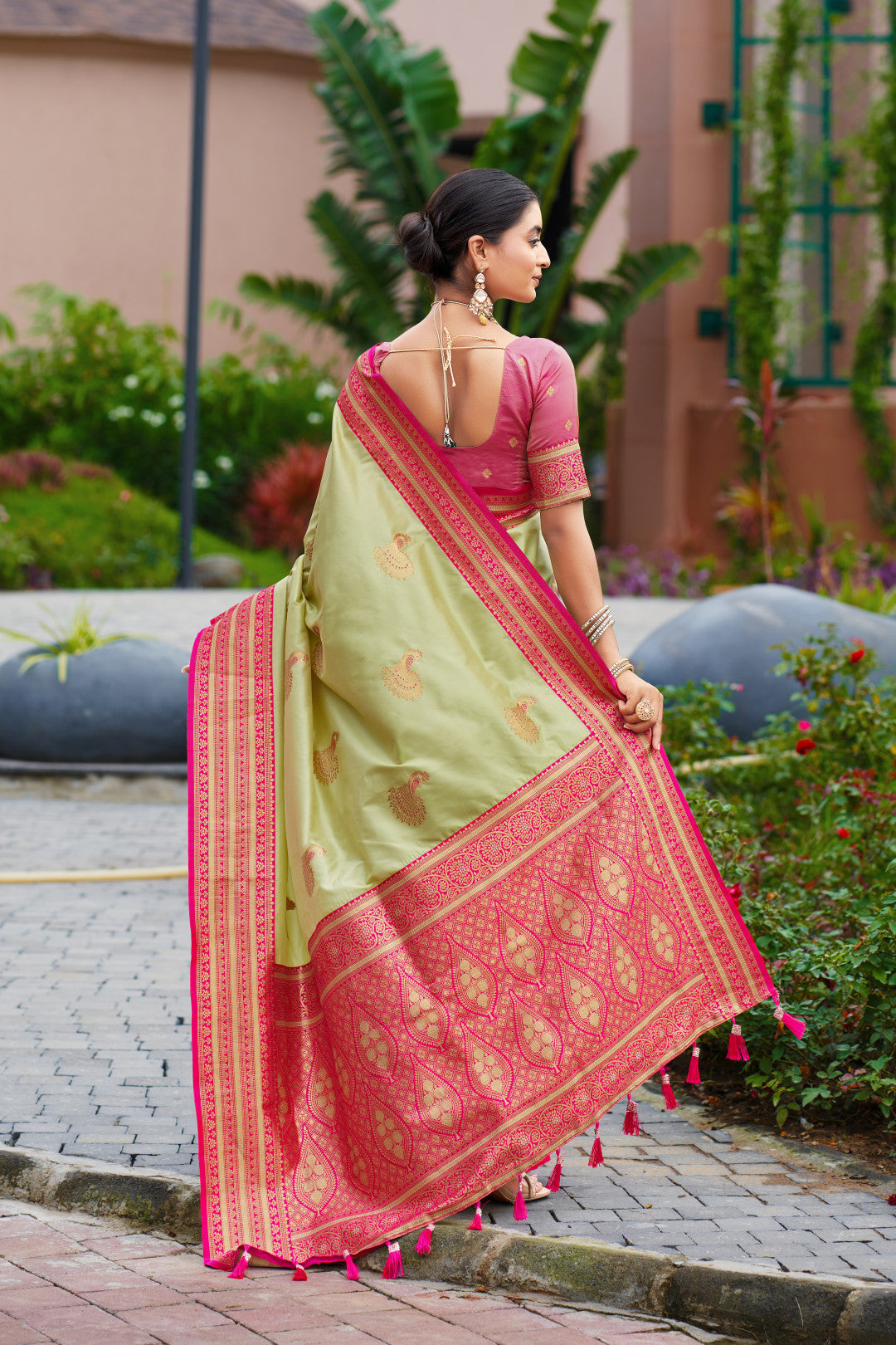 Back view of pista green Banarasi silk saree showing zari woven pallu design