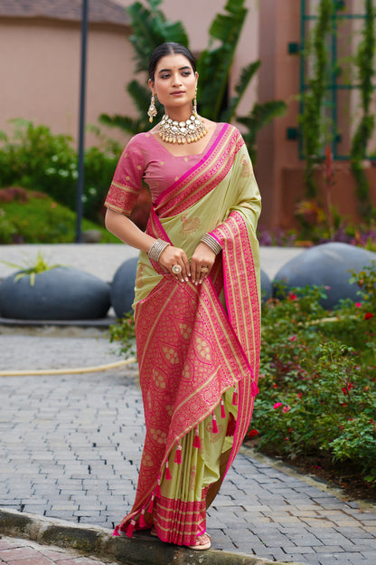 Model wearing pista green Banarasi silk saree with zari weaving in full length view