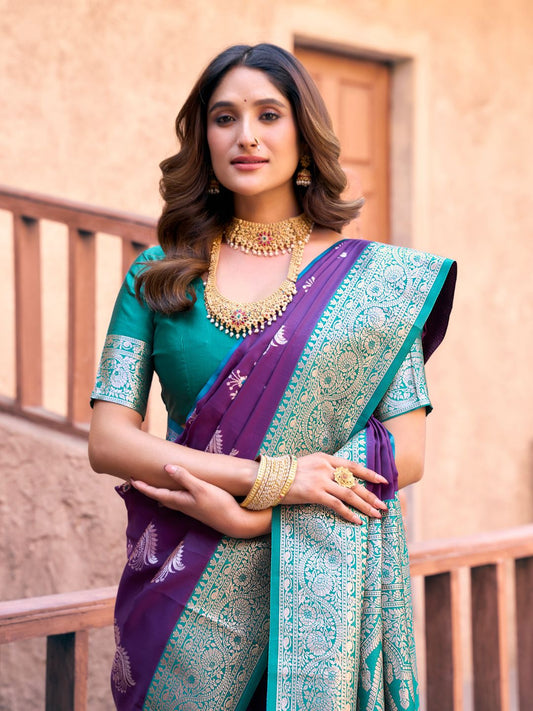 Close upper view of purple Banarasi silk saree showcasing Warli weaving work and zari detailing