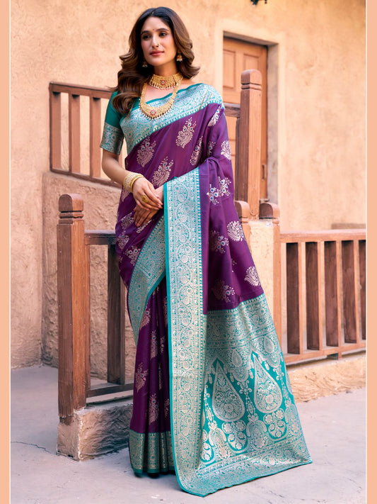 Woman wearing purple Banarasi silk saree with Warli weaving work and zhallar border full front view