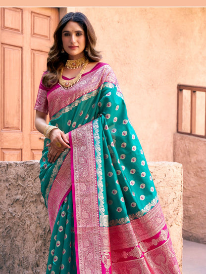 Side view of rama green Banarasi silk saree with Warli weaving work showcasing graceful drape