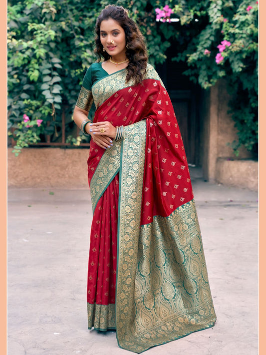 Woman wearing red Banarasi silk saree with Warli weaving work and zhallar border full front view