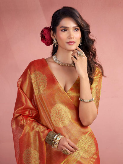 Side portrait of red tissue silk saree with fancy zari weaving butta highlighting graceful drape