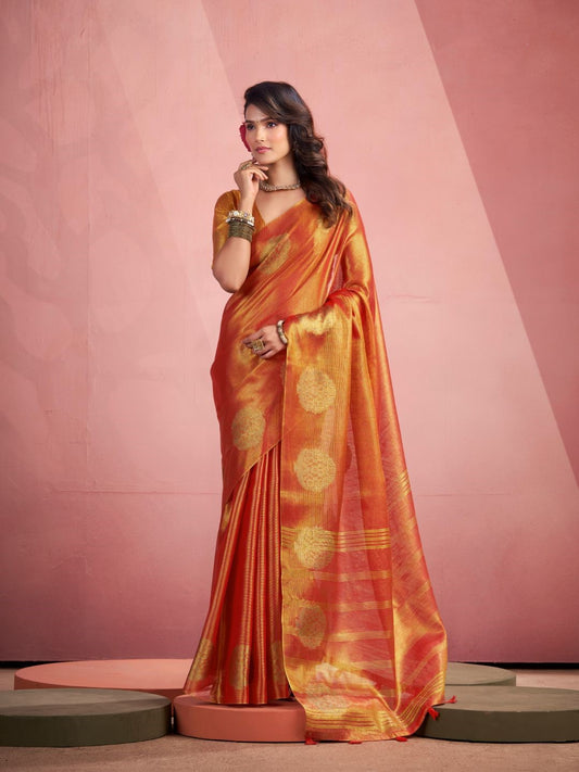 Woman wearing red tissue silk saree with fancy zari weaving butta full front view
