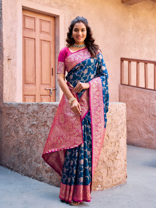 Woman wearing royal blue Banarasi silk saree with Warli weaving work and zhallar border full front view