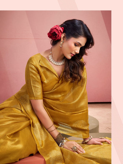 Close pose of yellow tissue silk saree highlighting zari weaving butta and rich fabric texture